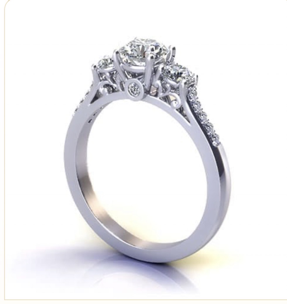 Bague de fiançailles trois pierres en or blanc